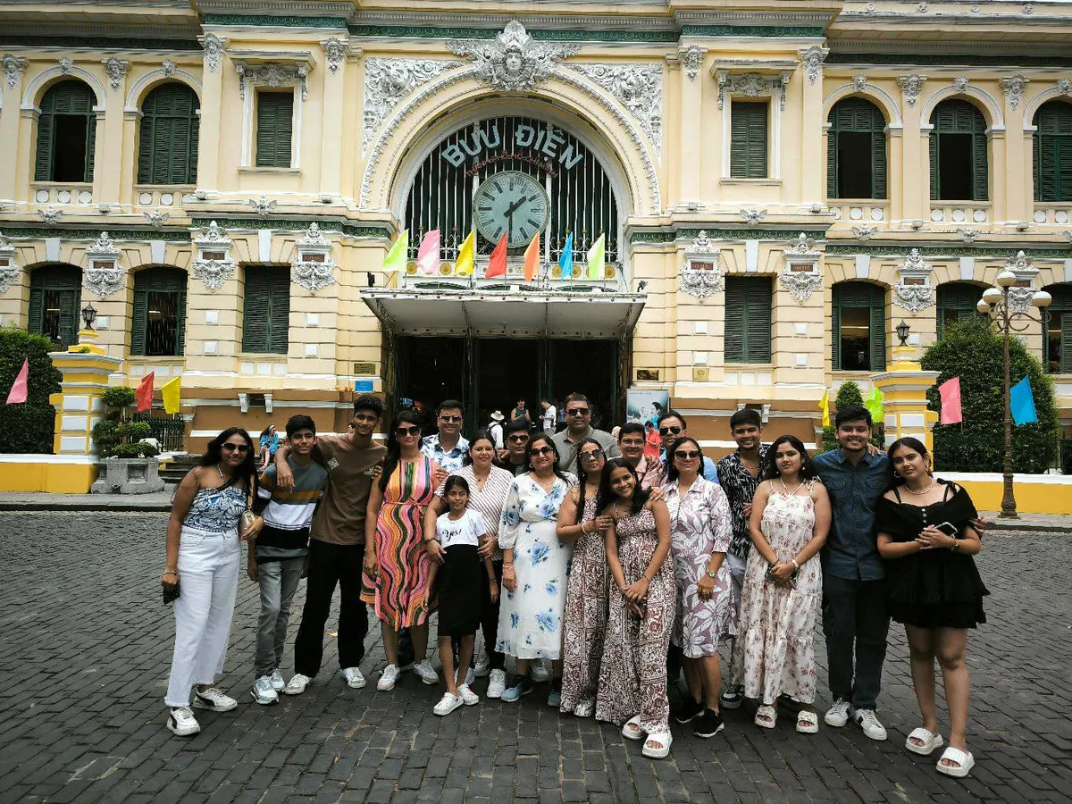 Guests outside Saigon's Central Post Office, the usual first stop of a city day