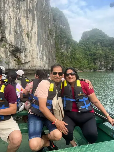 Bliss Tourism guests on tour — On the water at Trang An, Ninh Binh, Vietnam